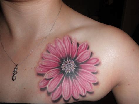 flores tattoo|girl with flowers tattoo.